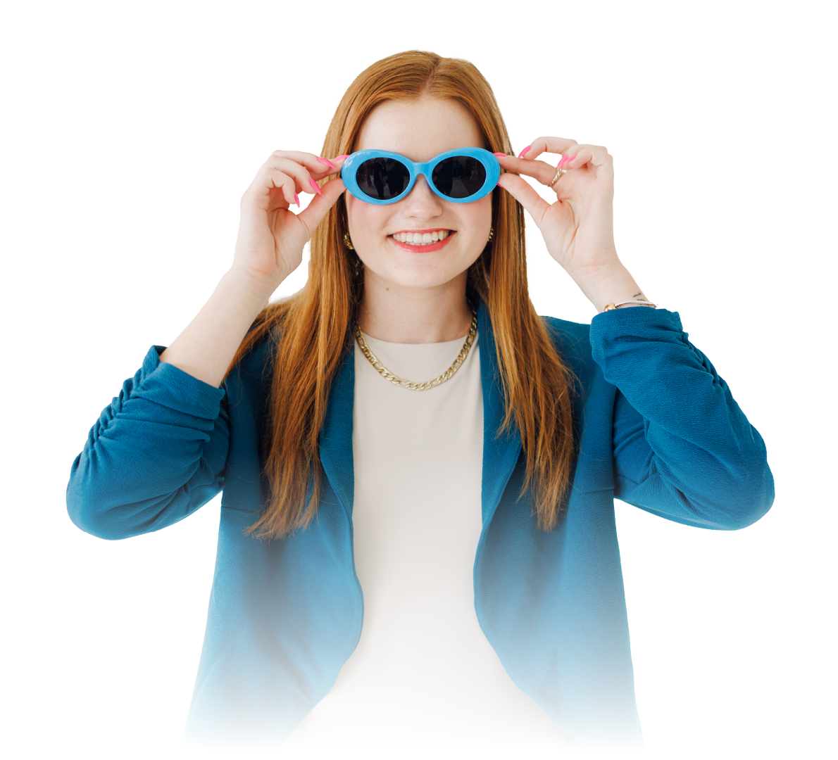 Woman holding blue goggles and smiling, wearing a blue jacket on a white background