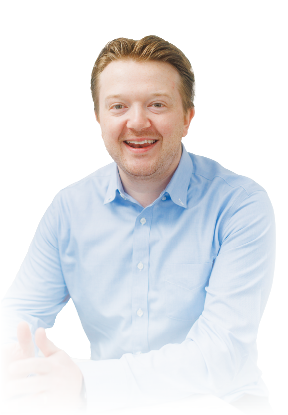 Smiling man in a light blue shirt against a white background