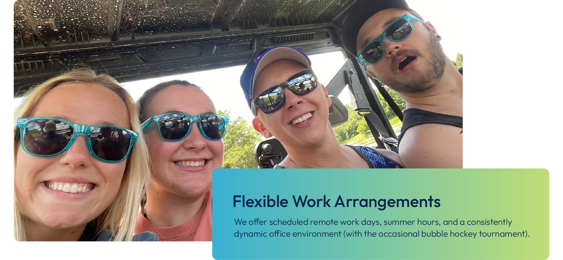 Four smiling coworkers in a vehicle with a sign reading “Flexible Work Arrangements”
