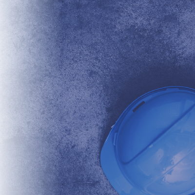 Blue hard hat on a textured blue-and-white surface