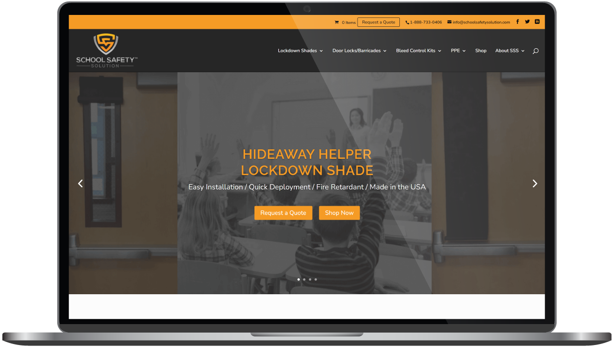 Laptop displaying a martial arts school website homepage with a gray hero image and orange navigation accents