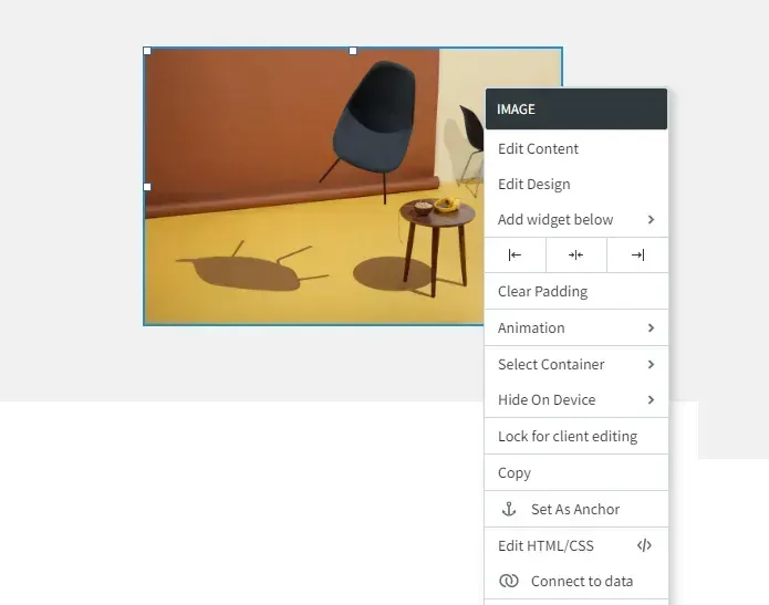 Office chair and small table in a room, with a context menu open on the right side of the screen