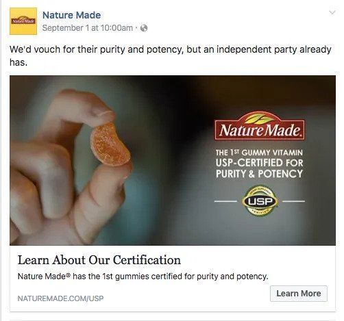 Nature Made ad showing a hand holding a gummy vitamin with text about USP-certified purity and potency