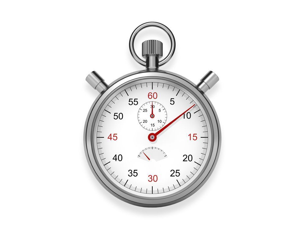 Silver stopwatch with red second hand on white background