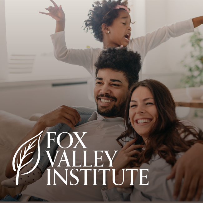 Smiling family relaxing on a couch with a child behind them; Fox Valley Institute logo in the corner