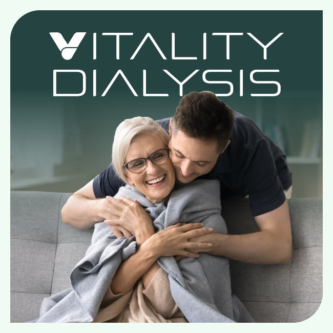 Vitality Dialysis logo above a smiling elderly woman hugging a younger man on a gray couch