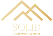 A logo for solid home improvement with a mountain in the background.