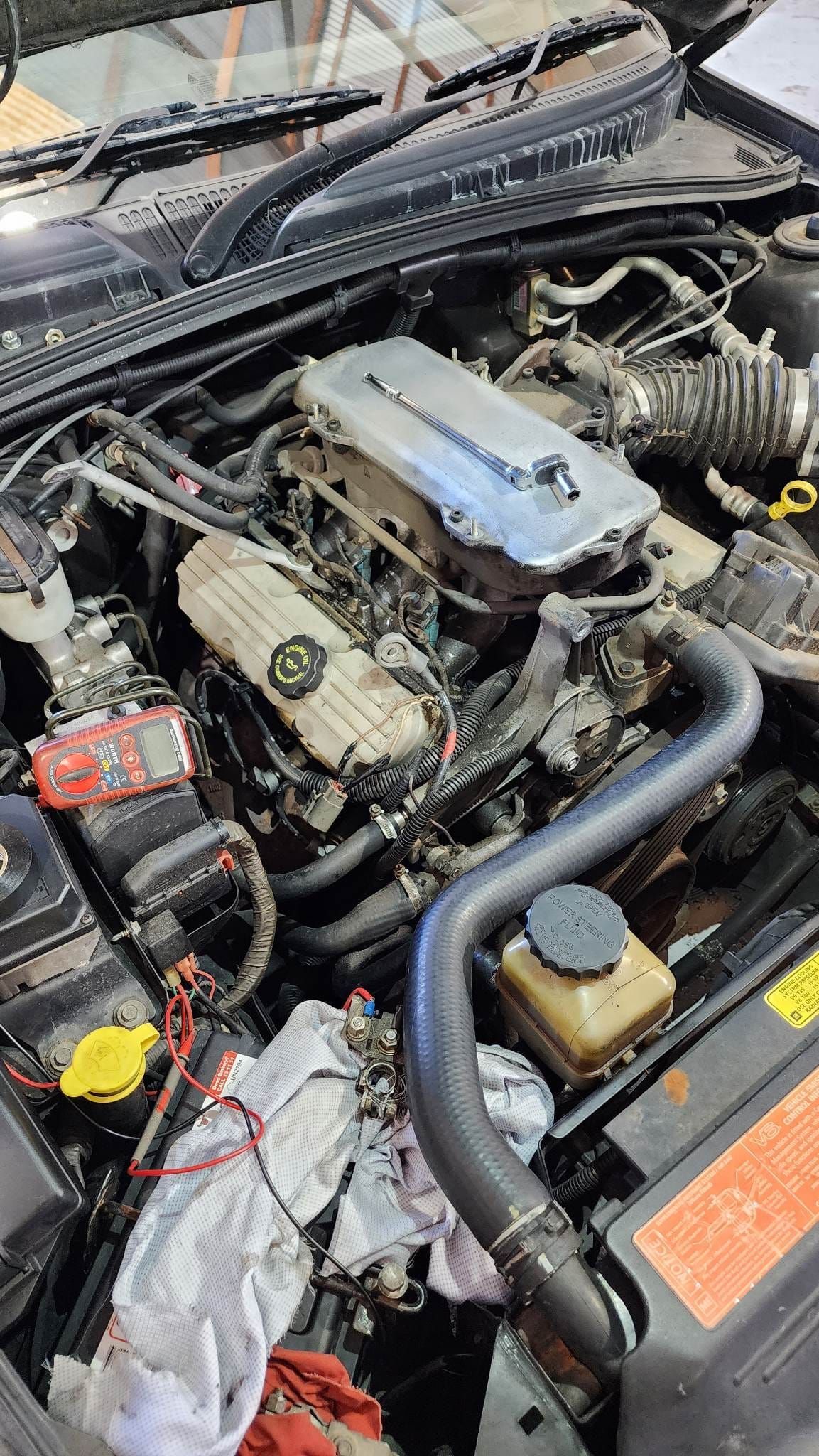 Donnellys Mechanical - Port Macquarie. A picture of a customer's vehicle being worked by Mechanics in Port Macquarie.