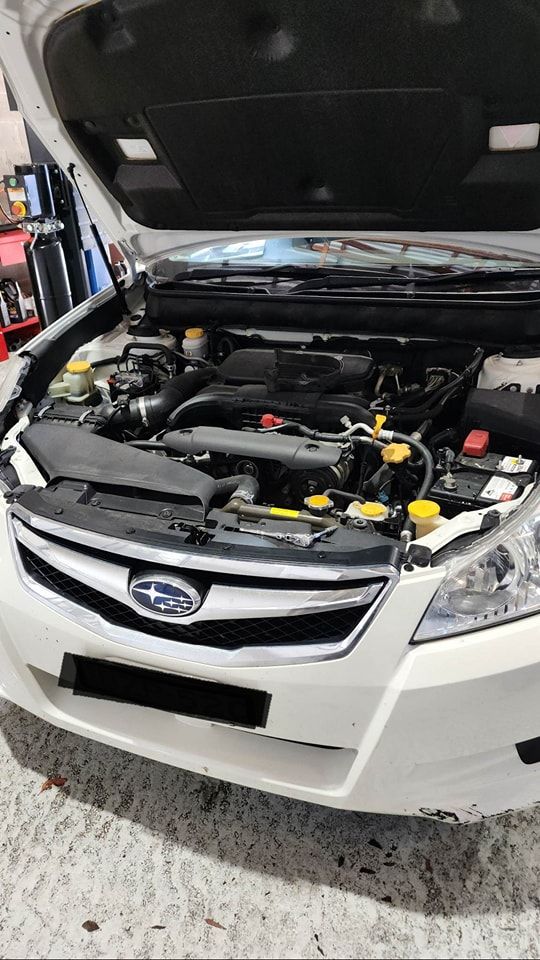 Donnellys Mechanical - Port Macquarie. A picture of a customer's vehicle being worked by Mechanics in Port Macquarie.