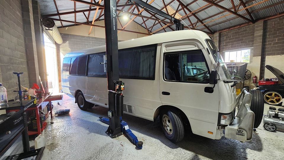 Donnellys Mechanical - Port Macquarie. A picture of a customer's vehicle being worked by Mechanics in Port Macquarie.