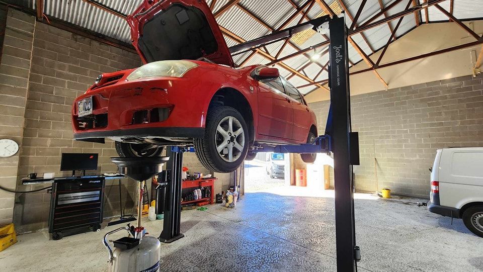 Donnellys Mechanical - Port Macquarie. A picture of a customer's vehicle being worked by Mechanics in Port Macquarie.