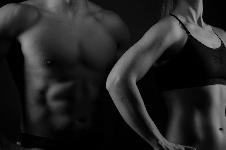 The girl taking measurements of her body, white background