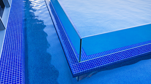 Swimming pool on roof top with stair at hotel — Pool Glaziers in Sydney, NSW