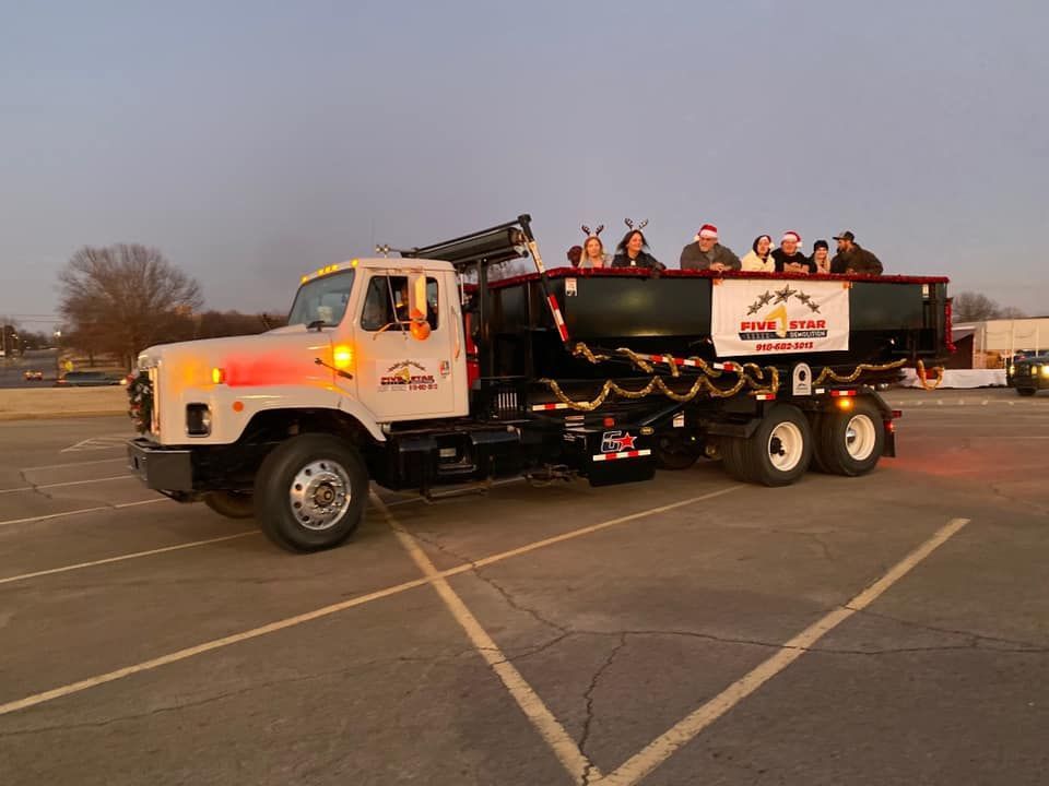 Dump Truck with People — Oktaha, OK — Five Star Roll-Offs Services