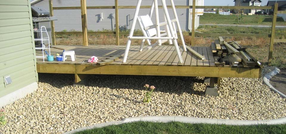 backyard with pebble and gravel landscaping