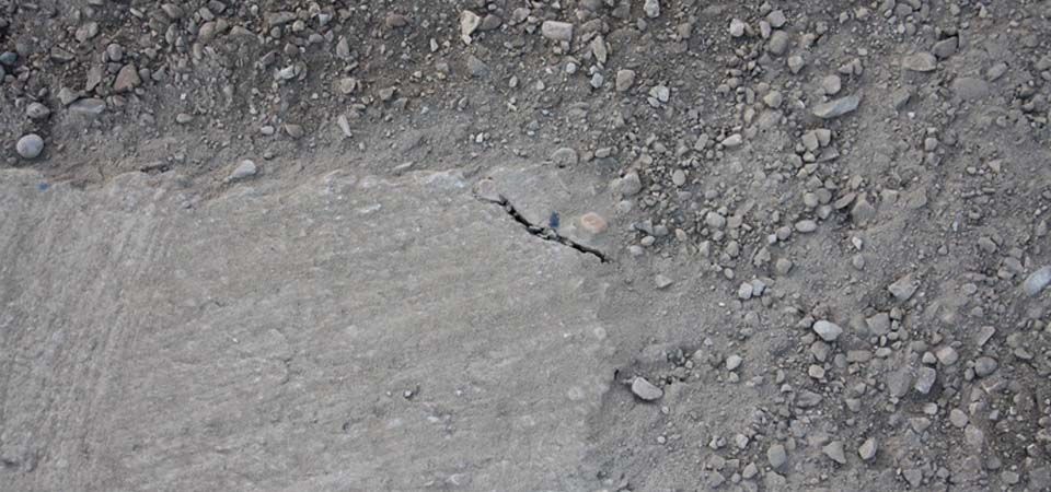 closeup of grey concrete and gravel