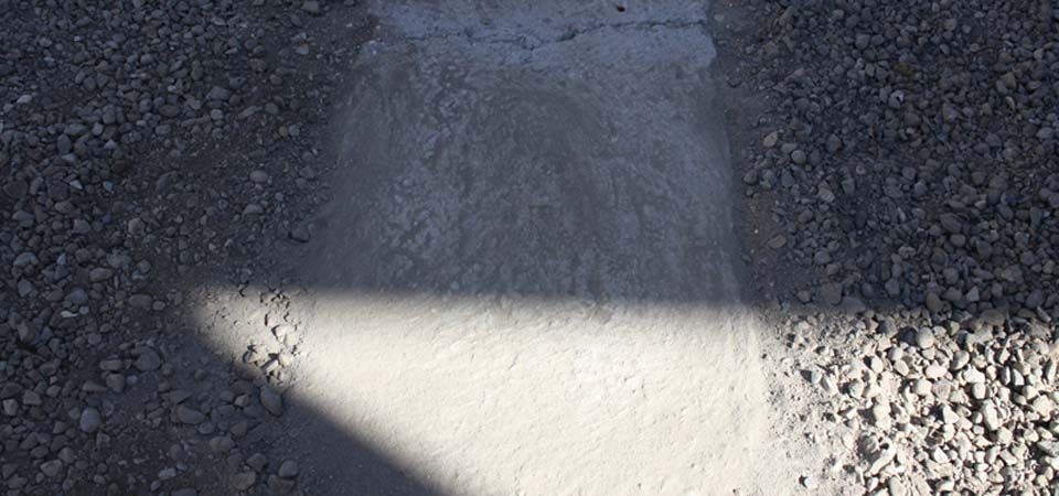 shaded concrete walkway surrounded