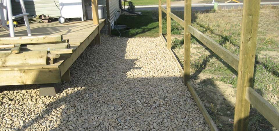 backyard with pebble landscaping