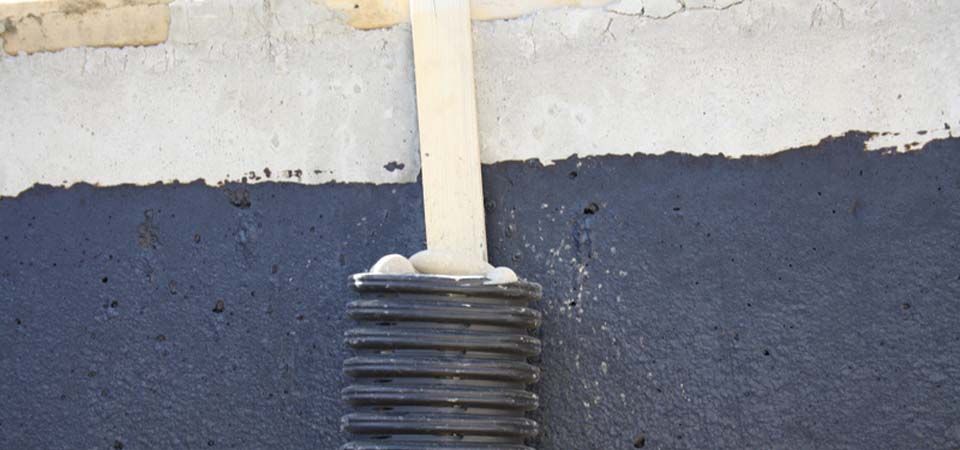 home siding with black tubing