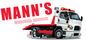 a mann 's wrecker service logo with a tow truck