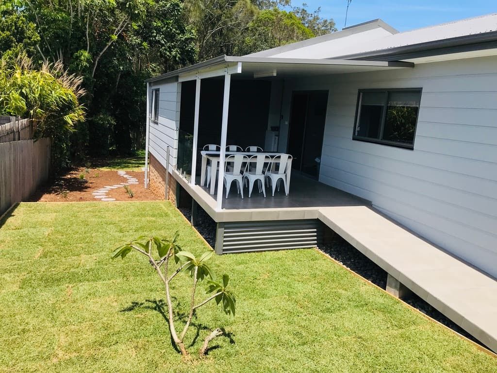 White House With a Covered Porch, Outdoor Dining, Ramp Access — Edmonds Bathroom Renovations & Tiling In Bonny Hills, NSW