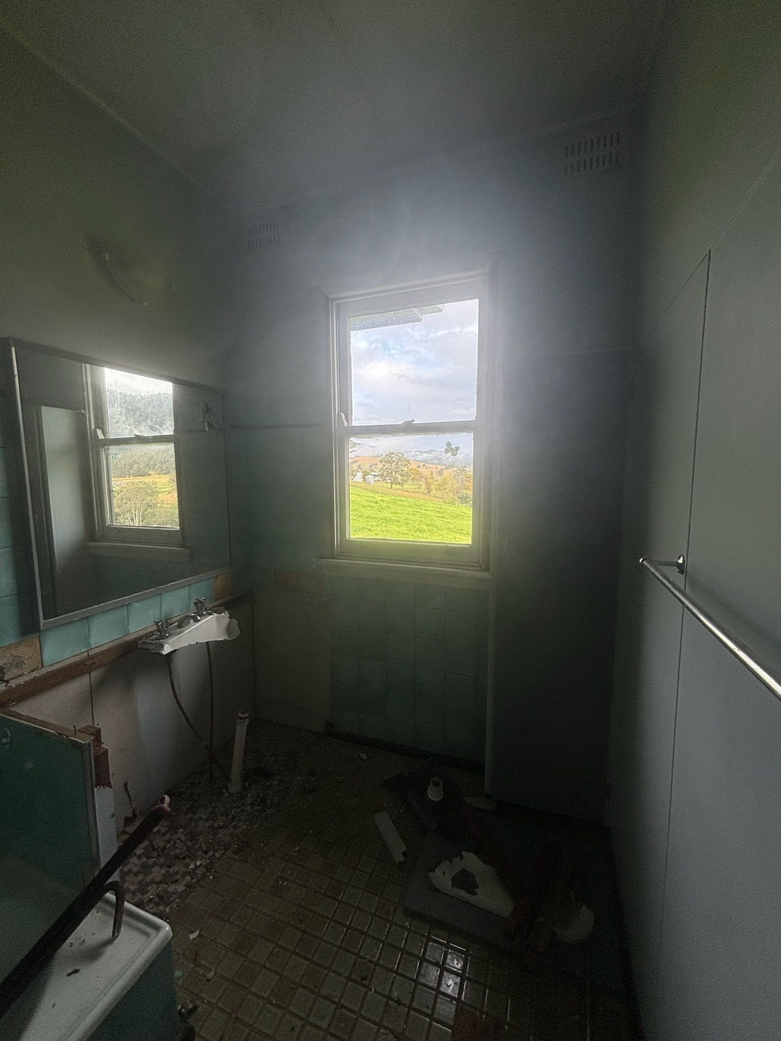 A Dilapidated, Green-tiled Bathroom — Edmonds Bathroom Renovations & Tiling In Bonny Hills, NSW