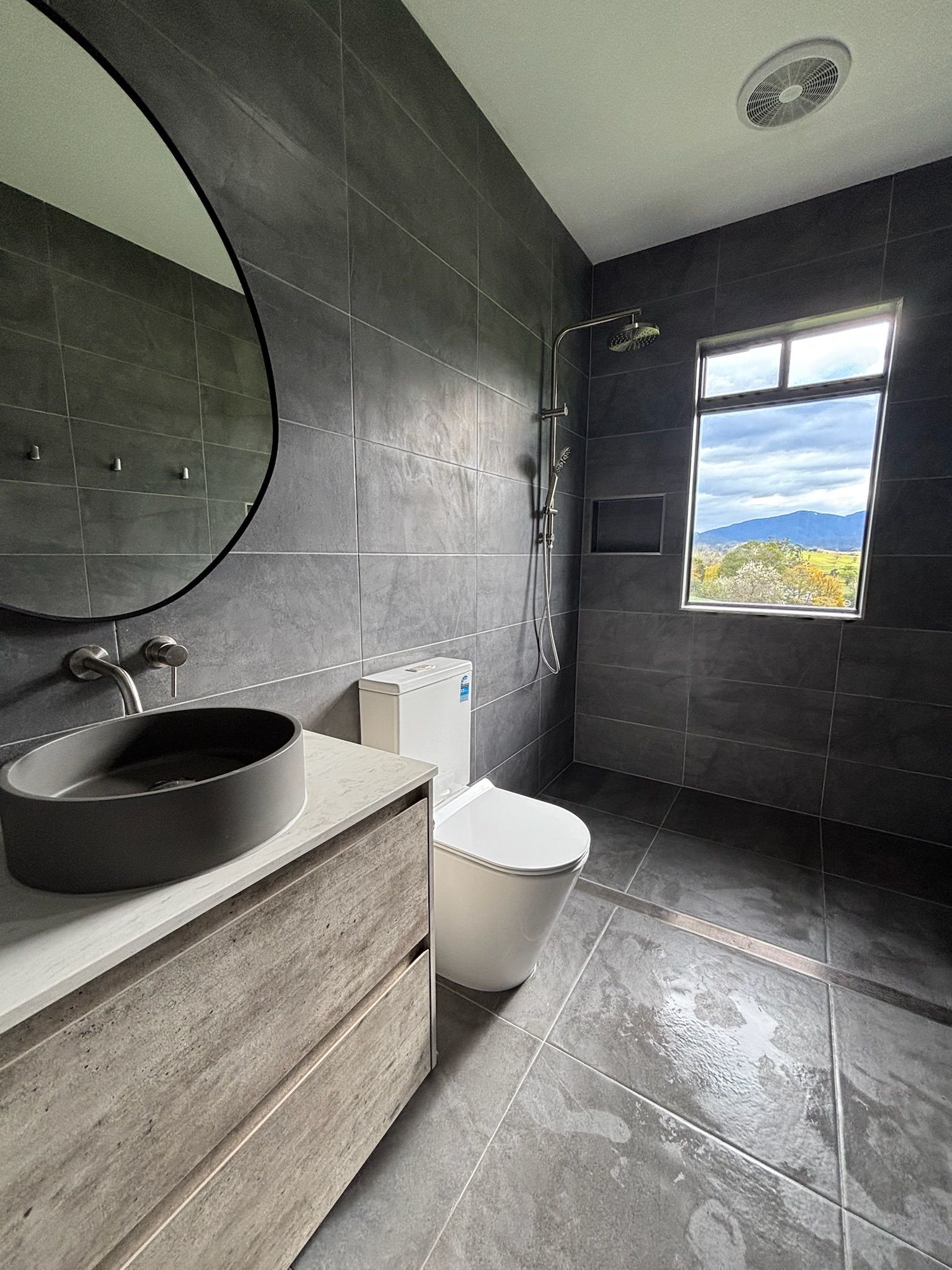 Modern Bathroom With Grey Tiles — Edmonds Bathroom Renovations & Tiling In Bonny Hills, NSW