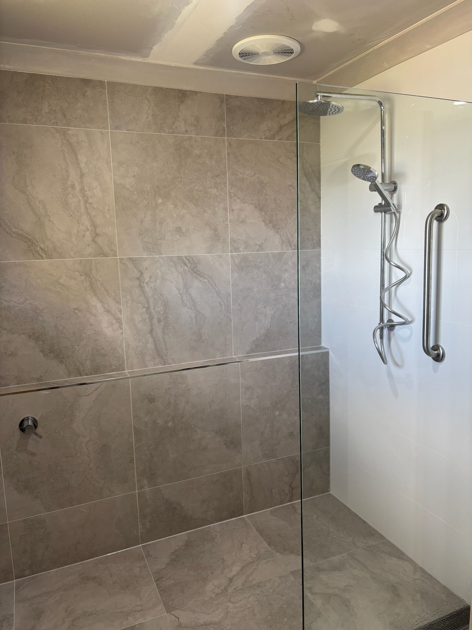 Shower With Gray Tiled Walls, Glass Door — Edmonds Bathroom Renovations & Tiling In Port Macquarie, NSW