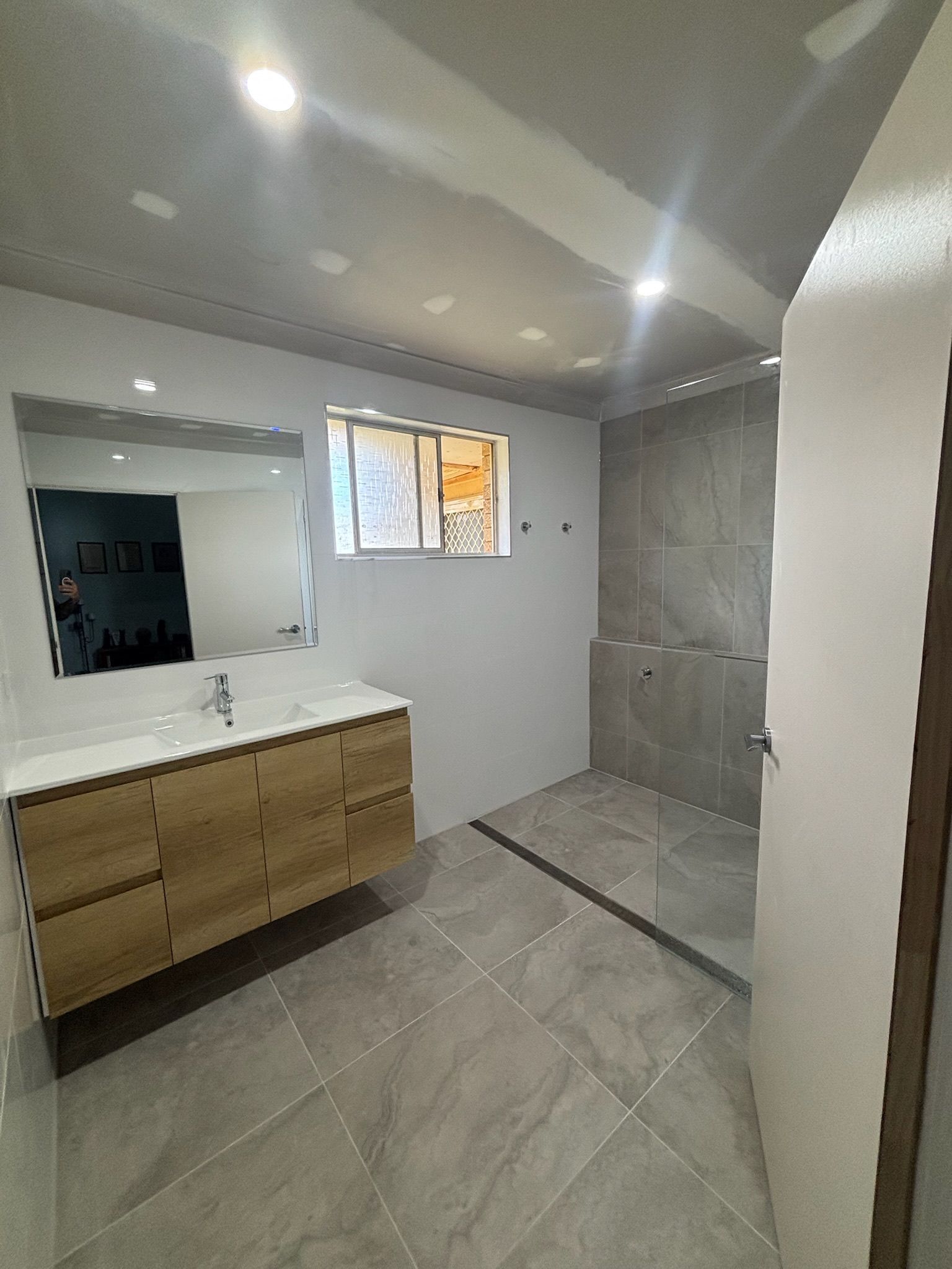Modern Bathroom With Wooden Vanity — Edmonds Bathroom Renovations & Tiling In Port Macquarie, NSW