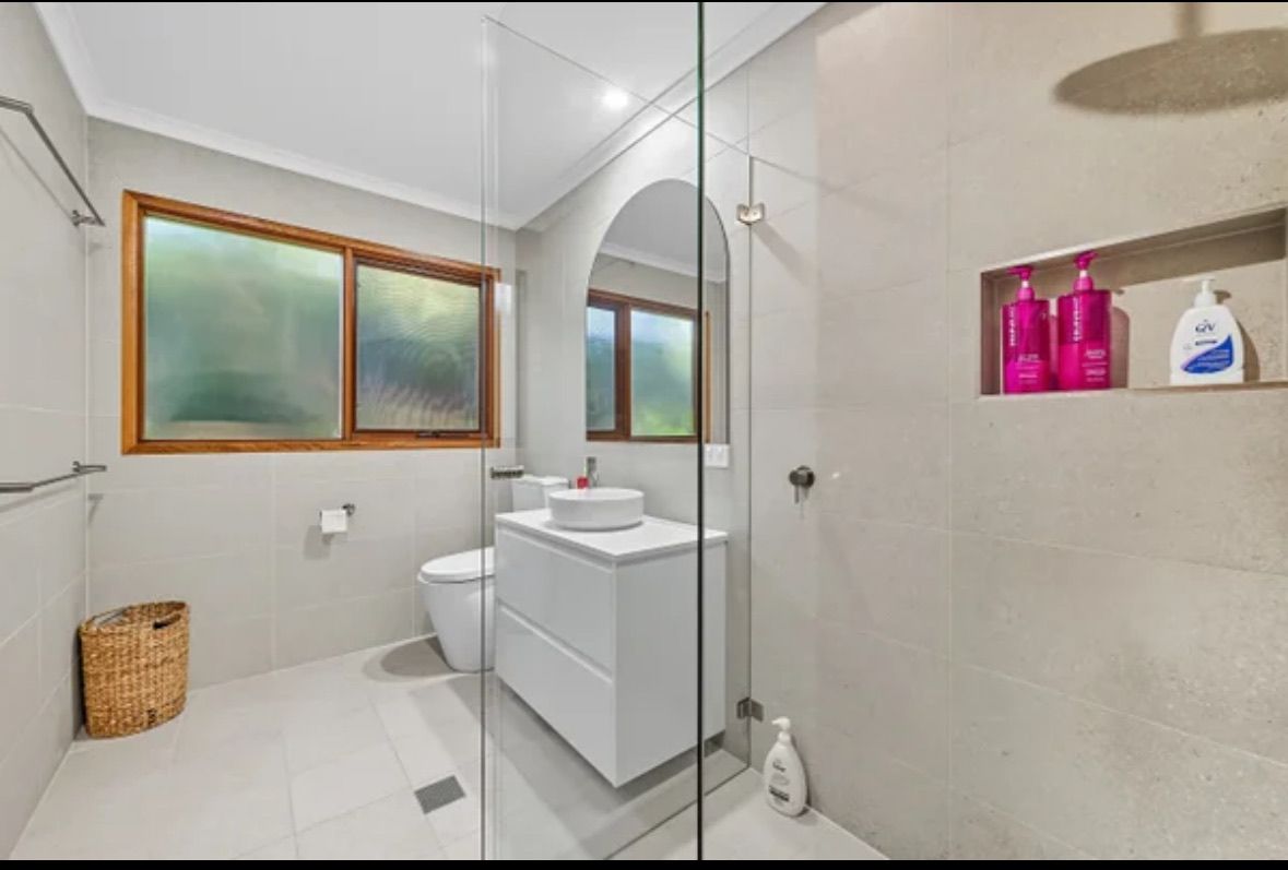 Bathroom With a Shower, Toilet, and Vanity — Edmonds Bathroom Renovations & Tiling In Wauchope, NSW