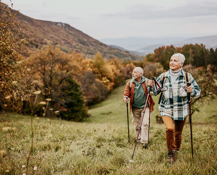 Couple hiking on a mountain.