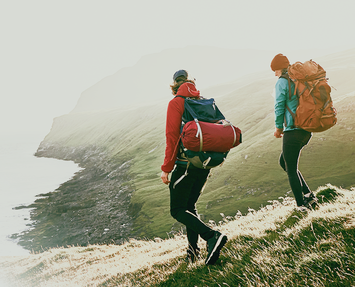 Couple hiking on a mountain.