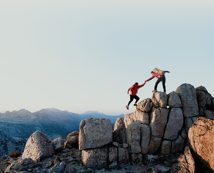 Couple hiking on a mountain.