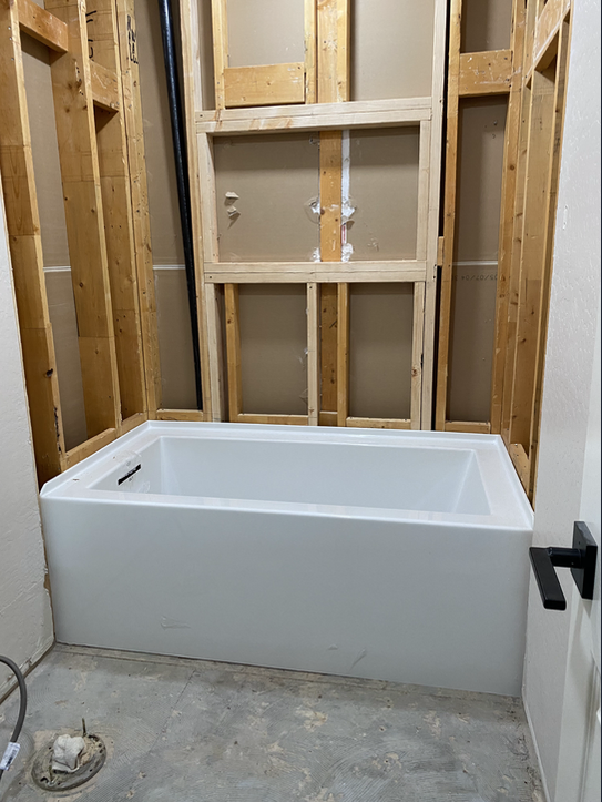 White Bathtub Under Construction - Surprise, AZ - Azevedo Plumbing Company