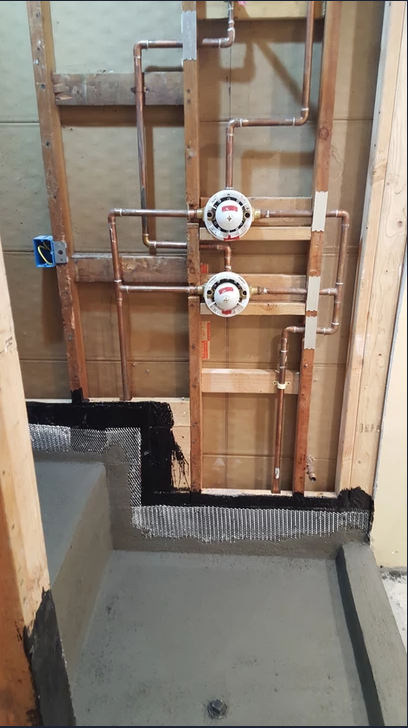 Bathroom Construction with the Pipe Going Through - Surprise, AZ - Azevedo Plumbing Company