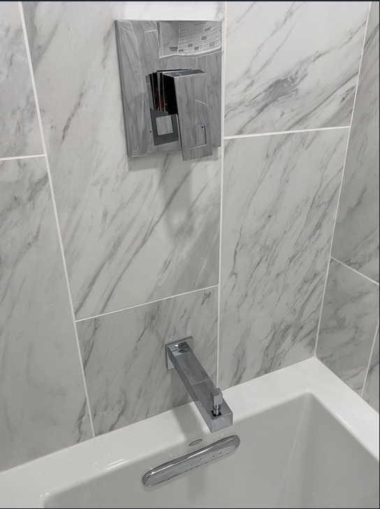 Bathtub with a Faucet Attached to the Wall - Surprise, AZ - Azevedo Plumbing Company