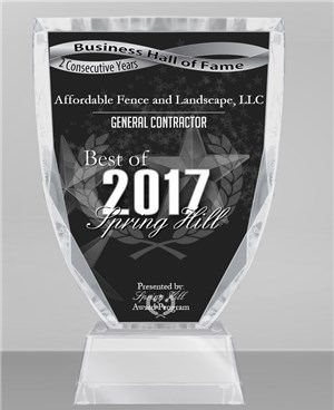 A crystal award trophy honoring Affordable Fence and Landscape, LLC as Best of 2017 in Spring Hill.