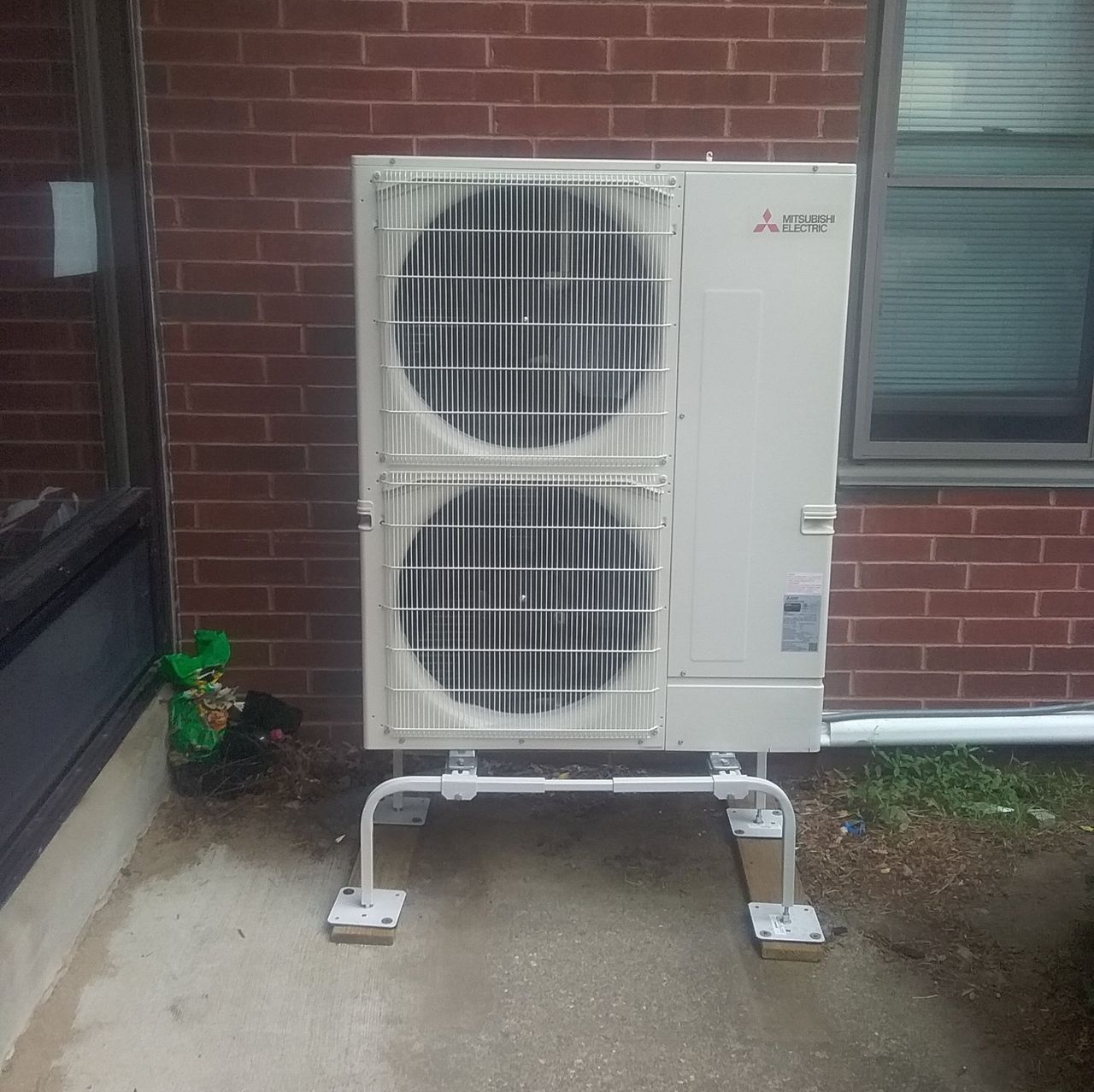 Air Conditioning Units Outside the House — Marlborough MA  — Bob Dolan Plumbing, Heating & Remodeling