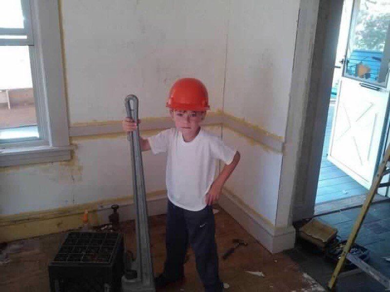 Child Wearing a Safety Hat — Marlborough MA  — Bob Dolan Plumbing, Heating & Remodeling