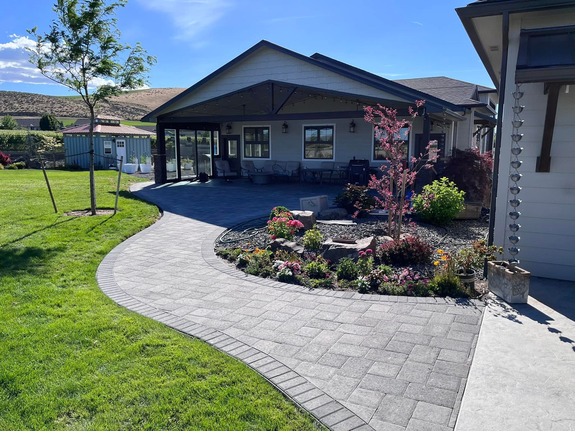 A house with a brick walkway leading to it