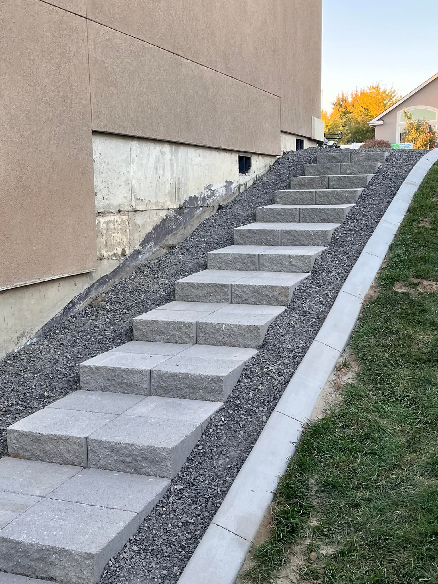 A set of stairs leading up to a house.