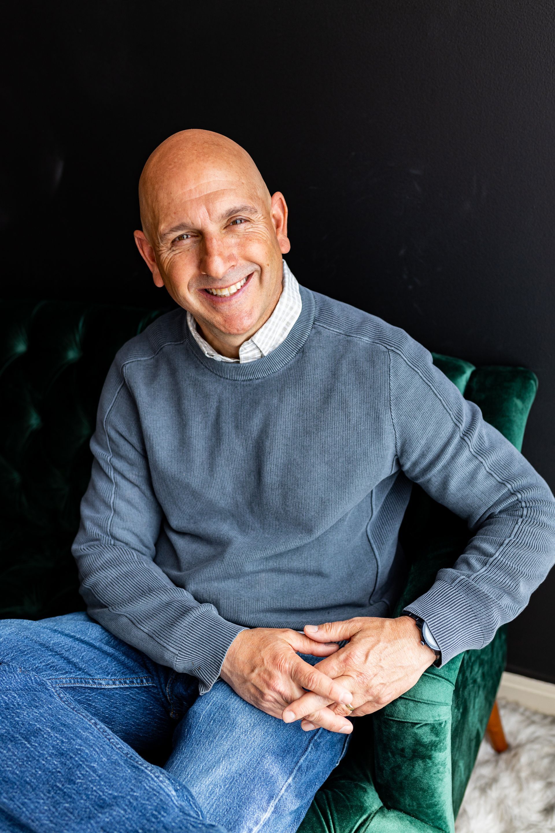 Business portrait man in a blue/grey sweater