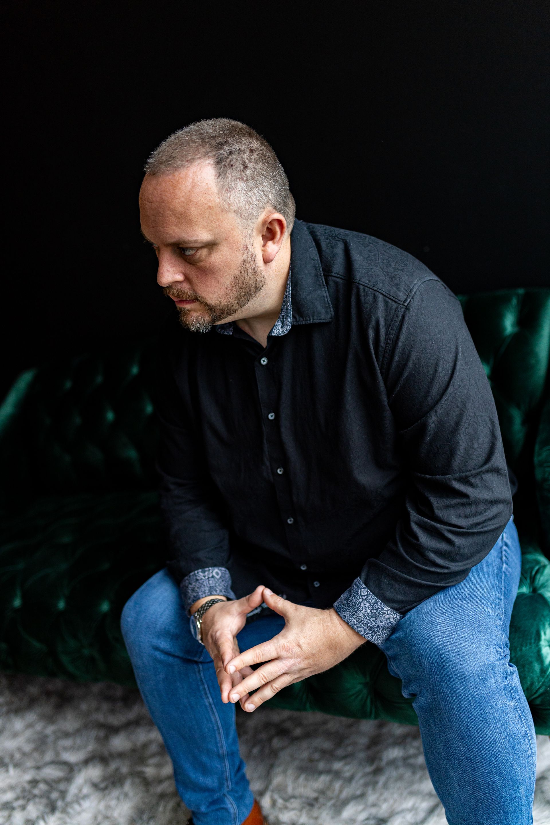 Business portrait - man in a black button up shirt