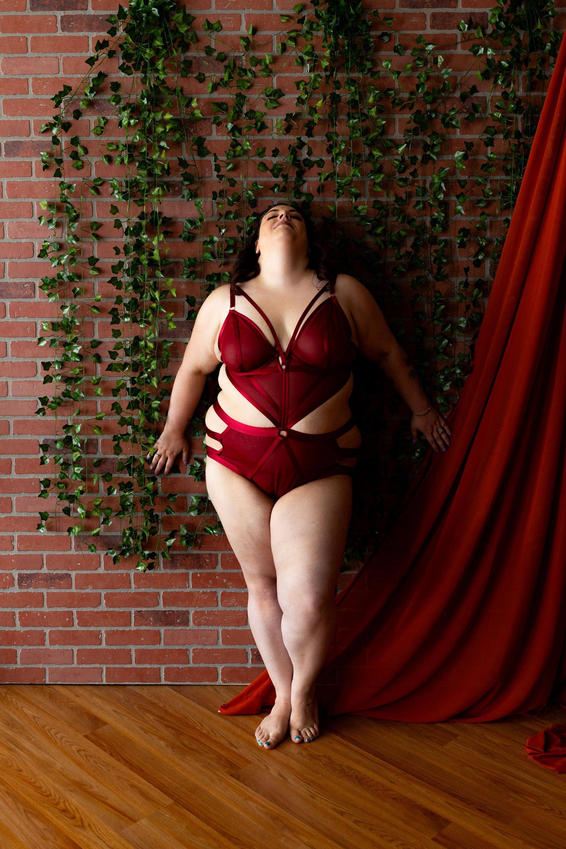 Boudoir photography woman in a spicy outfit - Lingerie red