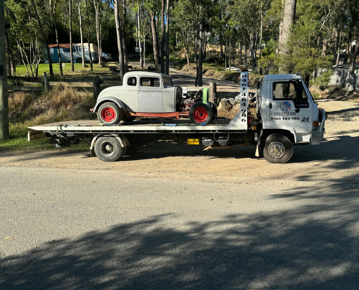 Green Land Rover on Tow Truck, on a Sunny Day — B&D Auto Group & Towing in Bowen, QLD