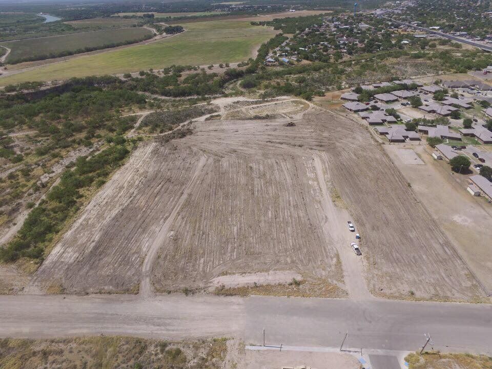 Top View Of Empty Lot With Two Car - Eagle Pass, TX - A.E. Hiller & Sons Inc.