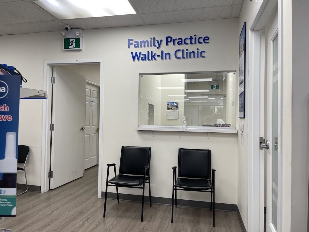 A waiting room with chairs and a sign that says family practice walk-in clinic