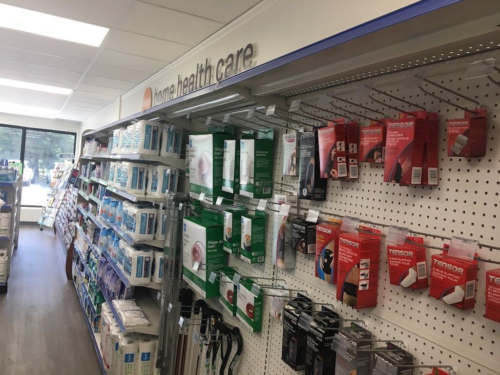 A pharmacy aisle filled with lots of healthcare products.
