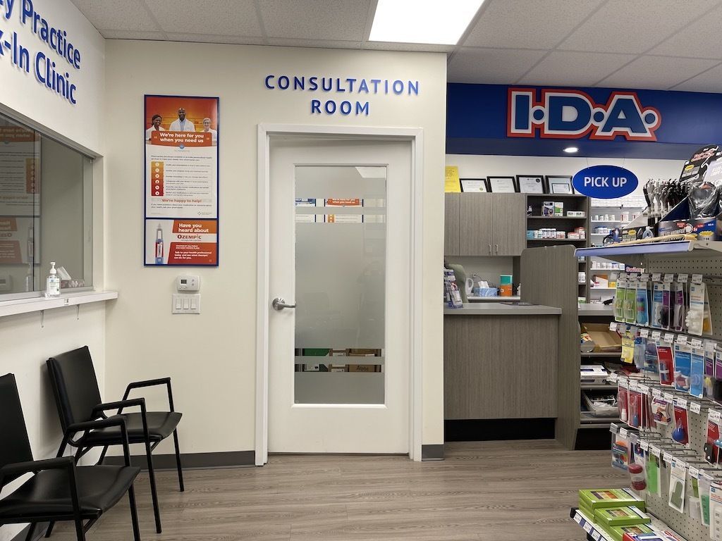 The inside of a pharmacy with a consultation room