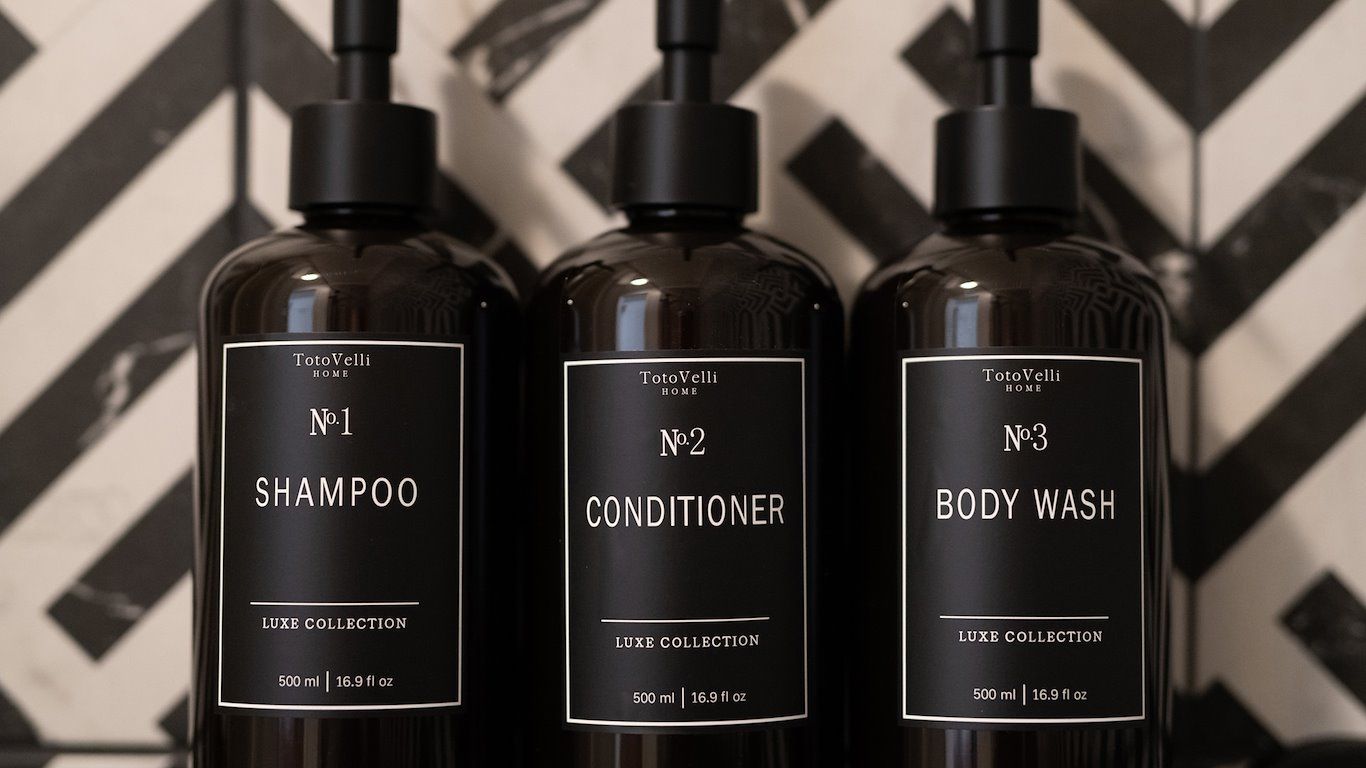 Three dark bottles labeled 